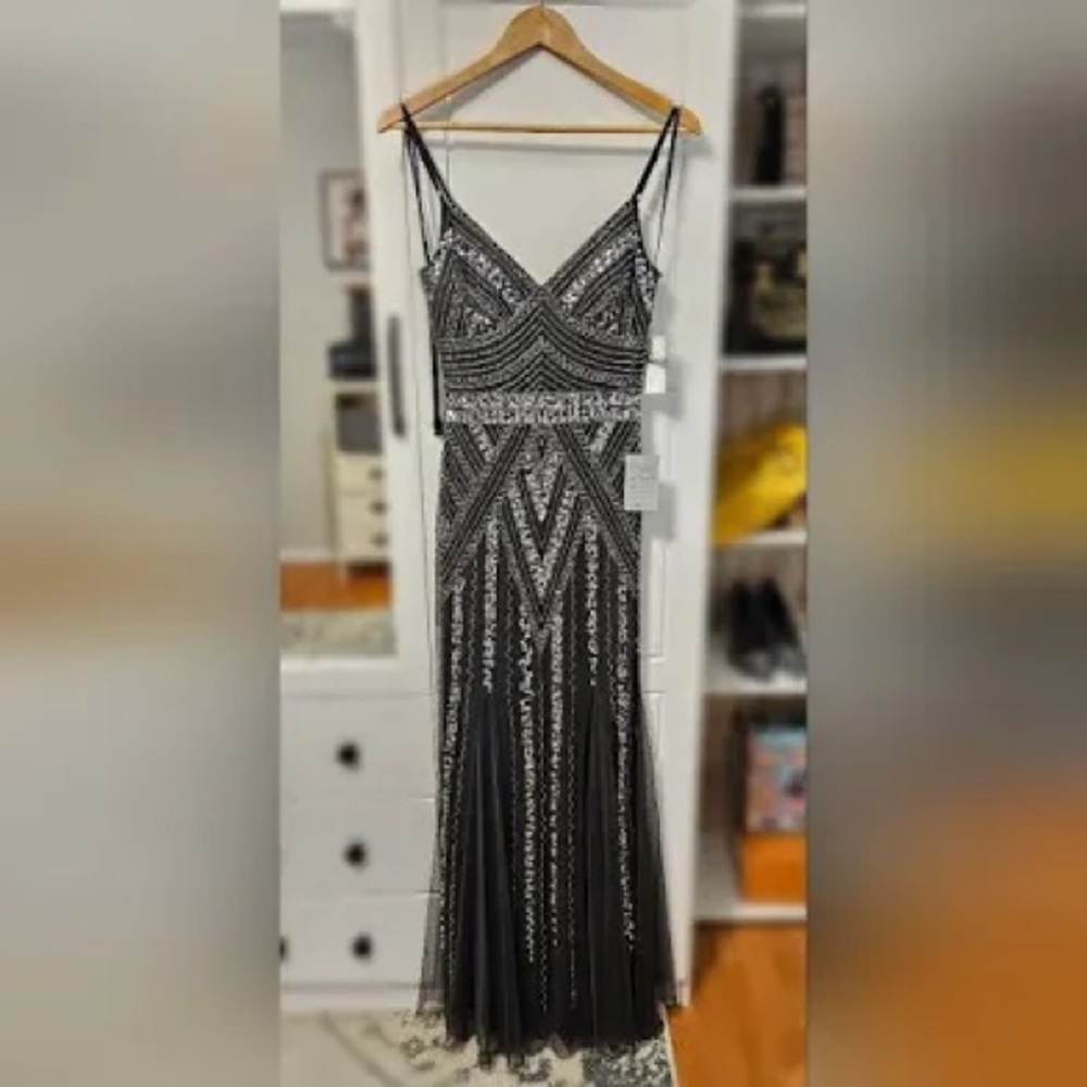 Marina beaded and sequined grey gown.